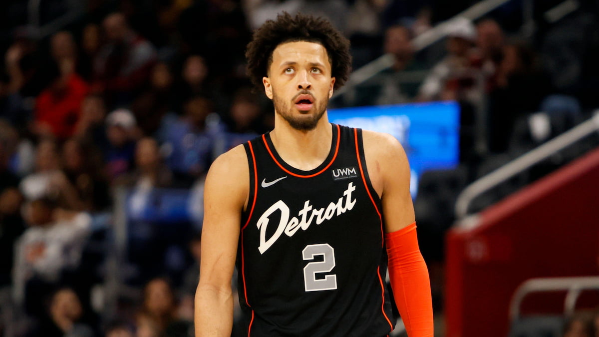 Detroit Pistons player looks disappointed after a loss.