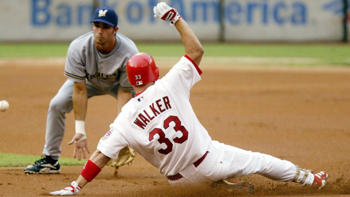 Larry Walker slides into base for the St Louis Cardinals.