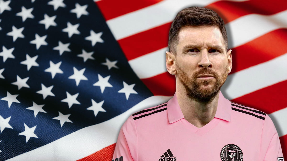 Leo Messi wearing Miami shirt in front of US flag.