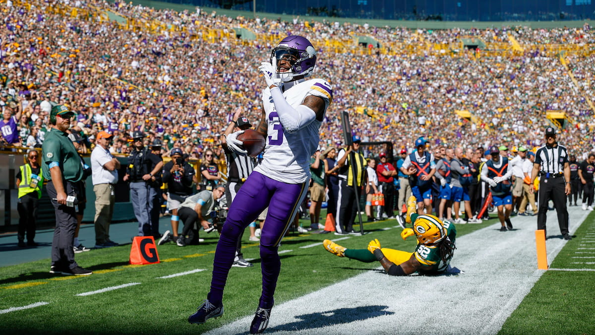 The Vikings score a touchdown against the Green Bay Packers.