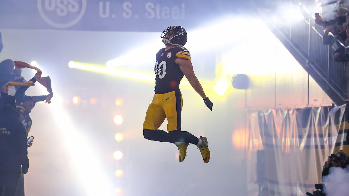 TJ Watt leaping into the air ahead of a game for the Steelers.
