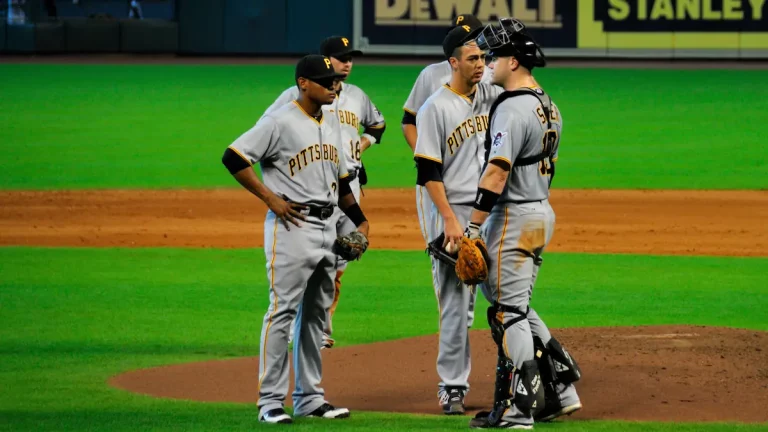 Pittsburgh Pirates players meet at the mound.