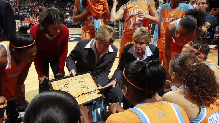 Coach Pat Summitt's speaking courtside to the University of Tennessee NCAA basketball team