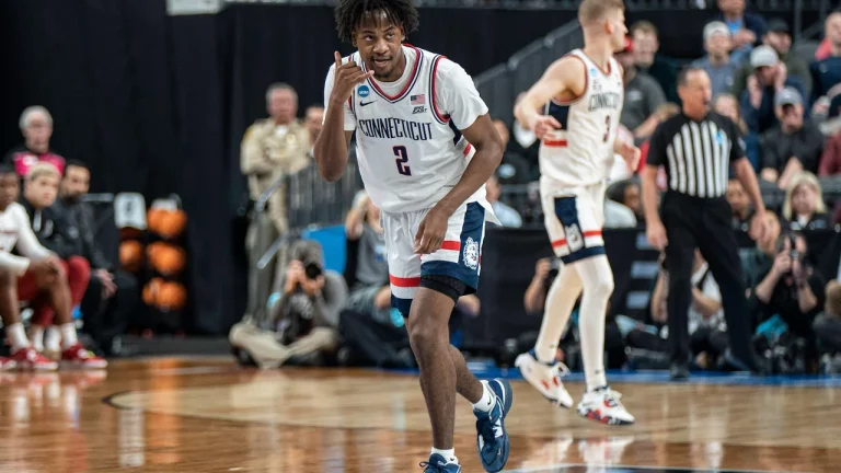 Connecticut Huskies guard Tristen Newton (2) celebrates after making a three pointer during a NCAA men's basketball tournament game