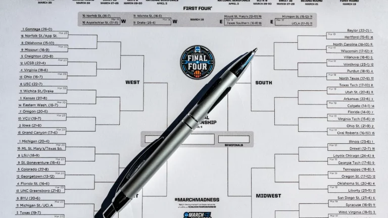March Madness bracket from 2021 and pen