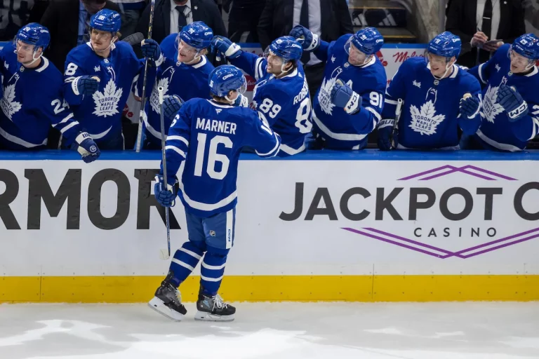 Mitch Marner celebrates a goal with his Toronto Maple Leafs teammates against the Ottawa Senators during the first period of an NHL playoff game.