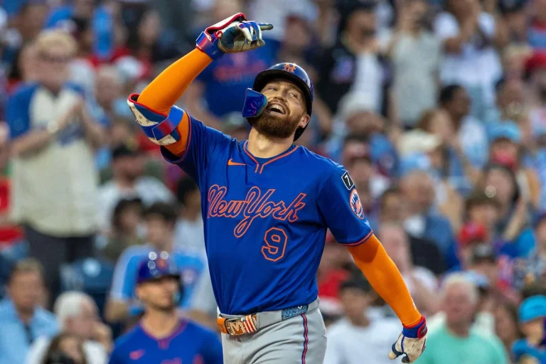 New York Mets' Brandon Nimmo celebrates after his solo home run in the third inning of a baseball game against the Philadelphia Phillies, Saturday, June 21, 2025, in Philadelphia.