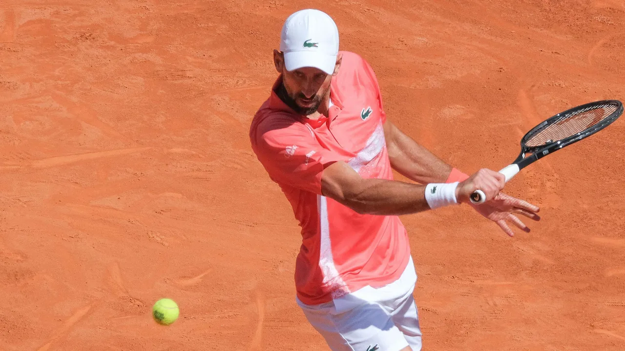 Novak Djokovic playing in the 2025 Madrid Open.