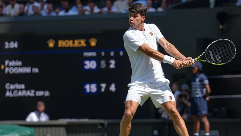 Carlos Alcaraz playing during Wimbledon in 2025.