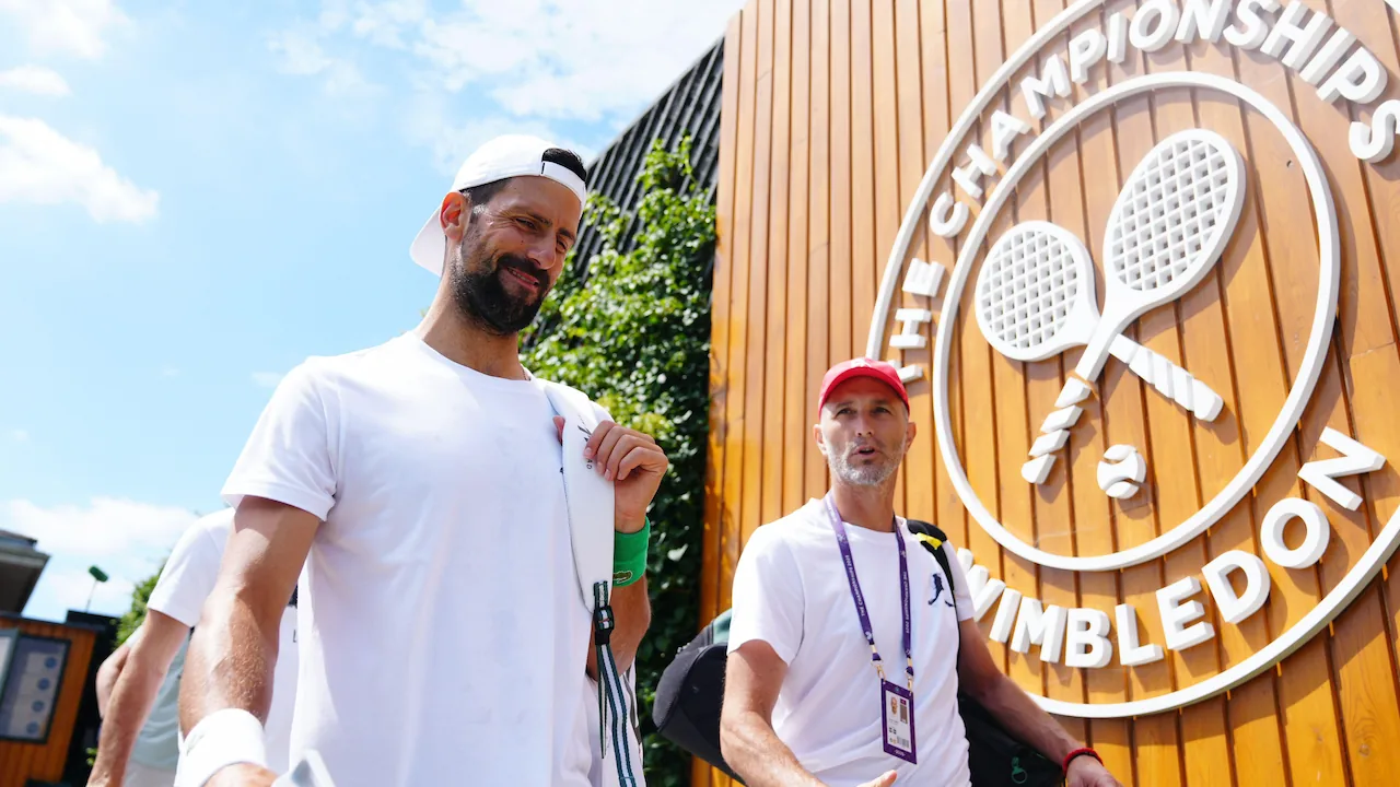 Novak Djokovic preparing to play a match at the 2025 Wimbledon.