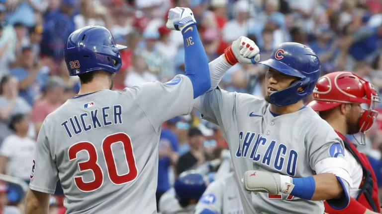 Kyle Tucker scoring a run for the Chicago Cubs.